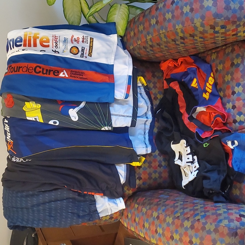 HUGE BUNDLE of cycling shorts and tops with bonus gloves!